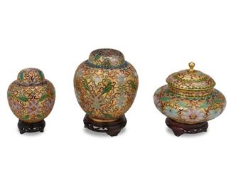 4246
Three Chinese Cloisonne Vessels
20th century
Each gold metal with enameled multicolor floral and leaf motifs with lid and wood stand, 3 pieces
Largest: 7" H x 4.5" Dia.; smallest: 5" H x 3" Dia.
Estimate: $400 - $600