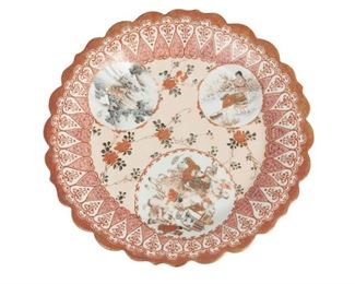 4249
A Set Of Japanese Kutani Porcelain Plates
20th century
Each with red overglaze Kutani mark
Each scalloped, glazed porcelain plate with gilt and red overglaze decoration consisting of roundels with figural scenes, 6 pieces
Each: 8.5" Dia.
Estimate: $200 - $400