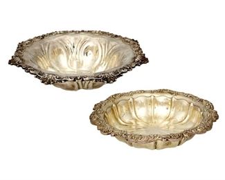 4252
Two American Sterling Silver Holloware Bowls
20th century
Marked for Gorham and Meriden sterling
Comprising a Meriden bowl with a scrolled rocaille rim (2.5" H x 10.75" Dia.) and a Gorham bowl with floral rim (2" H x 10.25" Dia.), 2 pieces
22.665 oz. troy approximately
Estimate: $400 - $600