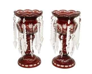 4294
A Pair Of Bohemian Cut-Glass Lusters
Late 19th/early 20th century
Each art glass luster cut from ruby to clear with floral motifs centering a stag, a squirrel, and a castle, 2 pieces
Each: 11.75" H x 6.25" Dia.
Estimate: $400 - $600