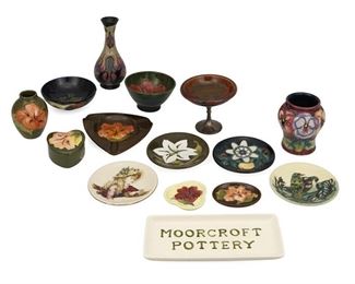 4306
A Group Of Moorcroft Decorated Pottery
20th century; Burslem, England
Each with Moorcroft backstamp; with further various dates and markings; bowl with royal warrant paper label reading: "Potter to H.M. The Queen Mary"
Comprising of a pewter based compote, four small dishes, a heart shaped box, two small trays, an ashtray, three vases, two bowls, and a tray with "Moorcroft," 15 pieces
Largest: 6.875" H x 2.75" W; smallest: 0.5" H x 2.75" W
Estimate: $200 - $300