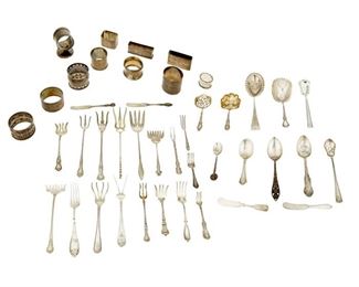 4314
A Group Of Sterling Silver Flatware
Late 19th/early 20th century
Each marked for sterling, with various maker's marks
Comprising spoons, forks, and napkin rings of various forms and patterns, makers include Gorham, Durgin, Mechanics Sterlings Co., and Baker-Manchester, together with one .800 silver napkin ring, 43 pieces
Largest: 9.125" L
33.56 oz. troy approximately
Estimate: $400 - $600