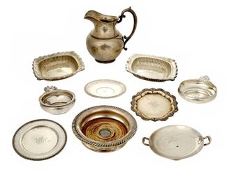 4318
A Group Of Sterling Silver Holloware
20th century
Each marked for sterling, with various maker's marks
In various patterns, comprising a pitcher, two porringers, three plates, two square dishes, and a short compote, together with a silver-plated bowl, makers include Spaulding, Wallace, Gorham, and more, 10 pieces
Largest: 8" H x 7" W x 5.5" D
Weighable sterling: 62.295 oz. troy approximately
Estimate: $800 - $1,200