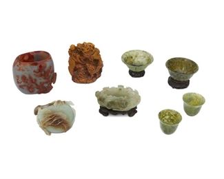 4334
A Group Of Five Carved Hardstone Asian Objects
Comprising of three carved jade bowls, decorated with various flora and fauna, as well the lotus jade bowl has a carved wood stand; one carved black stone turtle with red stone accent, and a carved yellow stone pair of dragons, 5 pieces
Estimate: $500 - $700
