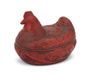4336
A Chinese Carved Cinnabar Chicken Box
Early 20th century
Lidded, sizable box with red, carved enamel on metal exterior and blue enamel interior
9.5" H x 11" W x 8" D
Estimate: $400 - $600