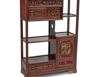 4337
A Chinese Carved Hardwood Cabinet
20th century
Constructed of mixed hardwoods with carved polychrome figural scenes, with a staggered arrangement of open shelves, a sliding door compartment, a cupboard, and a drawer
52.5" H x 36.5" W x 13.5" D
Estimate: $400 - $600