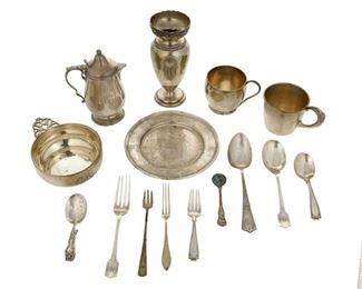 4353
A Group Of American Sterling Silver Holloware And Flatware
Early 20th century
Each marked for sterling, with various maker's marks
Comprising spoons and forks in various forms and patterns, two small cups, a small creamer pot, a vase, a bread plate, and a porringer, makers include Gorham, Wallace, Lebkuecher, and more, 15 pieces
Largest: 6.25" H x 2.375" Dia.
28.06 oz. troy approximately
Estimate: $400 - $600