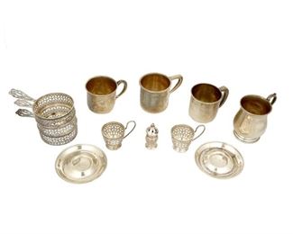 4355
A Group Of Sterling Silver Holloware
20th century
Each marked for sterling, with various maker's marks
Each variously patterned, comprising twelve pierced ramekin holders, four children's cups, six pierced small cup holders, six nut dishes, and four salt and pepper shakers, makers include Whiting, Gorham, Reed and Barton, 32 pieces
Largest: 1.25" H x 5.375" W x 3.125" D
38.095 oz. troy approximately
Estimate: $400 - $600