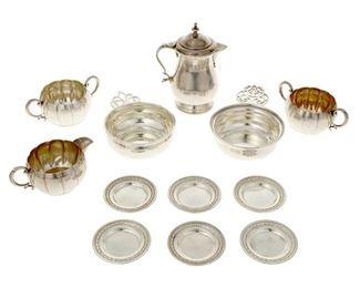 4357
A Group Of American Sterling Silver Holloware
Early/mid-20th century
Each marked for sterling, with various maker's marks
In various patterns, comprising a matching set of pumpkin-form sugar bowl, waste bowl, and a creamer; a small lidded creamer; two porringers; and six small nut dishes; maker's include Lunt, R. Wallace, Gorham, and Paul Revere Reproduction, 12 pieces
Largest: 6.25" H x 4.5" W x 3.25" D
31.35 oz. troy approximately
Estimate: $300 - $500