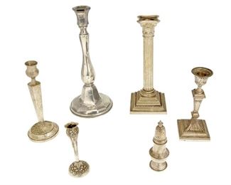 4360
A Group Of Weighted Sterling Silver Items
Late 19th/early 20th century
Each marked for sterling, with various maker's marks
Comprising seven variously designed candlesticks and four salt and pepper shakers, 11 pieces
Largest: 11.25" H x 5" Dia.
Estimate: $500 - $700
