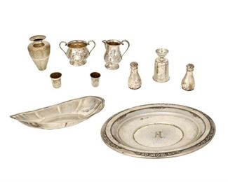 4361
A Group Of Silver Holloware Items
Mid/late 20th century
Each marked for sterling or .800 silver, with various maker's marks
In various designs, comprising a vase, a round pate, an oval tray, a pair of salt and pepper shakers, two small Russian cups, a footed cup, and a matching creamer and sugar bowl, makers include International, 9 pieces
Largest: 1.875" H x 12.125" W x 6.75" D
39.365 oz. troy approximately
Estimate: $500 - $700