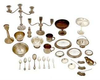 4362
A Group Of Sterling Silver Table Items
19th/20th century
Each marked for sterling, with various maker's marks
Comprising flatware, weighted candelabra, weighted compotes, weighted salt and pepper shakers, cups, bowls, and cut-glass trays of various forms and patterns, makers include Saben, Gorham, Towle, and more, 33 pieces
Largest: 11.5" H x 11.5" W x 4" D
Weighable sterling: 94.265 gross oz. troy approximately
Estimate: $500 - $700