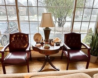 Two of 3 tufted chairs , and vintage mahogany leather top table.