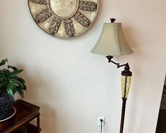 Nice articulating floor lamp and large Mexican wall decor.