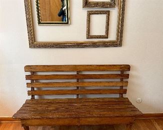Sturdy wood bench, and some antique frames.