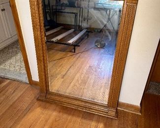 Large oak beveled mirror.