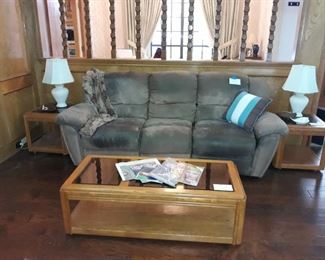 Sofa and coffee table with matching end tables.