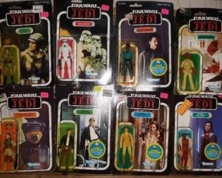 Sealed collectible Kenner Star Wars action figures from 1983 Return of the Jedi and 1980 Empire Strikes Back