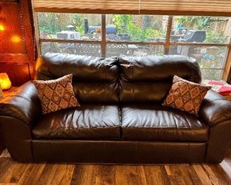 Full size leather couch with full size couch bed
