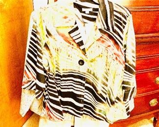 Extremely elegant selection of size 14-18 clothing!! With lots of shoes, purses and hats to match! 