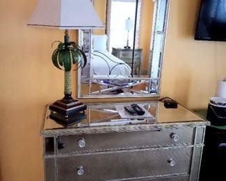 Mirrored dresser and matching mirror
Palm tree lamp