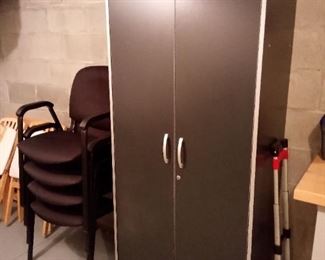 Large storage cabinet
(4) black chairs