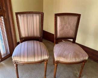 Pair of pink satin side chairs (one striped, one striped/floral)