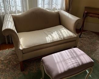 Light green striped settee and small upholstered bench in lilac
