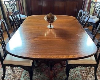 1 of 2 large dining tables. This one includes 2 optional leaves