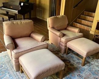 Pair of pink upholstered club chairs and matching ottomans 