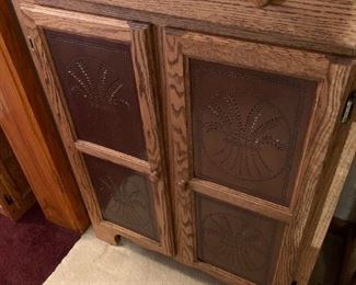 Punched Tin front oak cupboard.