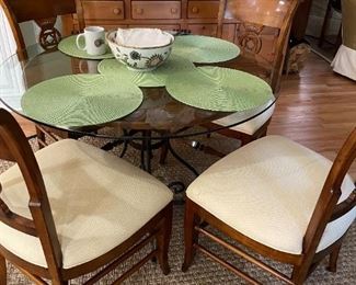 Round Glass Top Table with Four Chairs