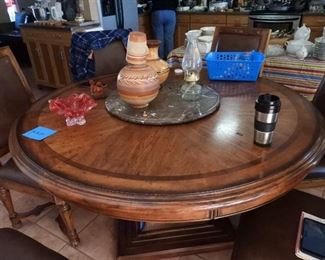 60" round wood dining table with two 12" leaves and  6 chairs