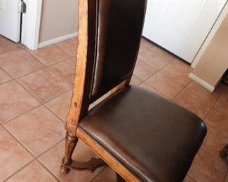 Leather and wood chairs.  6 total