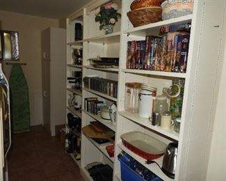 Pantry full of books, cookware, baskets, and more!
