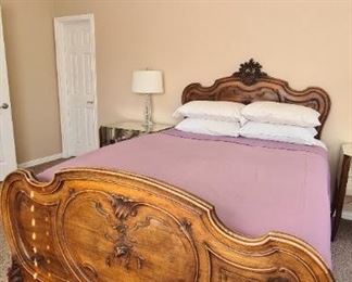 Queen bed, made in France, antique item. H30, W60, L87, mattress, and two pillows included. $2.000
