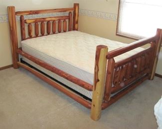 Queen sized log bed