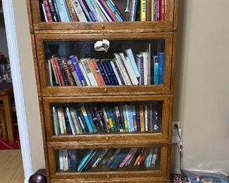 6ft high solid wood book case (top glass panel missing) $150
