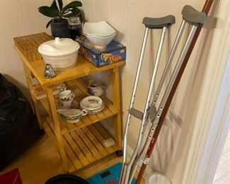 Crutches, roasting pan, scale, $5/each. Kitchen cart with wheels $10, Game free.