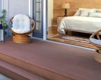 Pappasan chairs are the focus of this picture.  They swivel and rock. C. 1970.