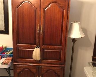 Armoire with matching side cabinets 