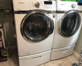 Samsung front loader washer and dryer with pedestals 