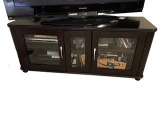 Black TV / Entertainment Center EC146-36
Regular price$200.00 USD     Description: This beautiful & sturdy multi-functional TV & Entertainment cabinet in espresso color offers glass-panel front doors, 4 sliding & vented interior shelves, a built-in power strip & removable back panels with open slots for cables. 
Condition: Very good
Dimensions: 55 x 20 x 24"H
Local pick up Vienna VA.  Located on basement floor.  Please contact us for shipper suggestions.    https://goodbyhello.com/products/black-entertainment-center-ec146-36?_pos=1&_sid=56f01cbf9&_ss=r