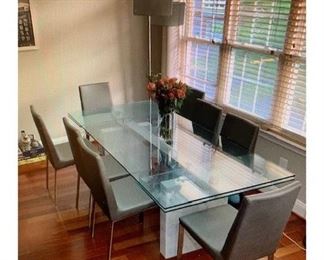 $7000 USD    Roche Bobois Stone Square Dining Table NT120-1      Description: Top in 15mm thick natural glass.  Aluminum crossbar with glossy polished finish.  Base in Carrara marble. 2 integrated extension leaves of 40cm in glass.

Condition:  Excellent

Dimensions: 39 x 86 x 30H

Local pick up only.  Contact us for shipper suggestions     https://goodbyhello.com/products/rouche-bobois-stone-square-dining-table-nt120-1?_pos=2&_sid=5632ea2d6&_ss=r