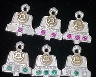 10k Gold vintage c&p telephone charms for years of service diamonds are real other stones are probably real as well but not 100% these are not gold filled there solid.