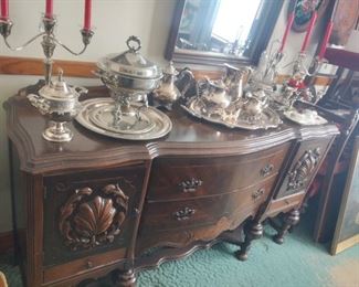 sideboard with silverplate items 