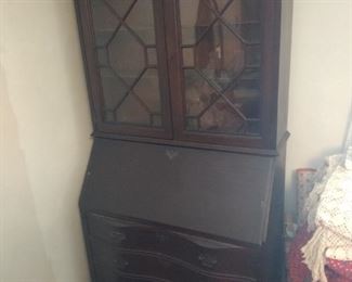  broken arch drop front secretary with bookcase ball and claw feet 