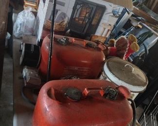 Vintage marine gas cans full of gas and more