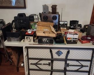 tons of vintage radio equipment and record players cameras tubes etc etc