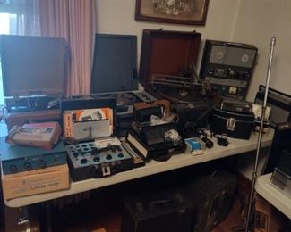 tons of vintage radio equipment and record players cameras tubes etc etc 